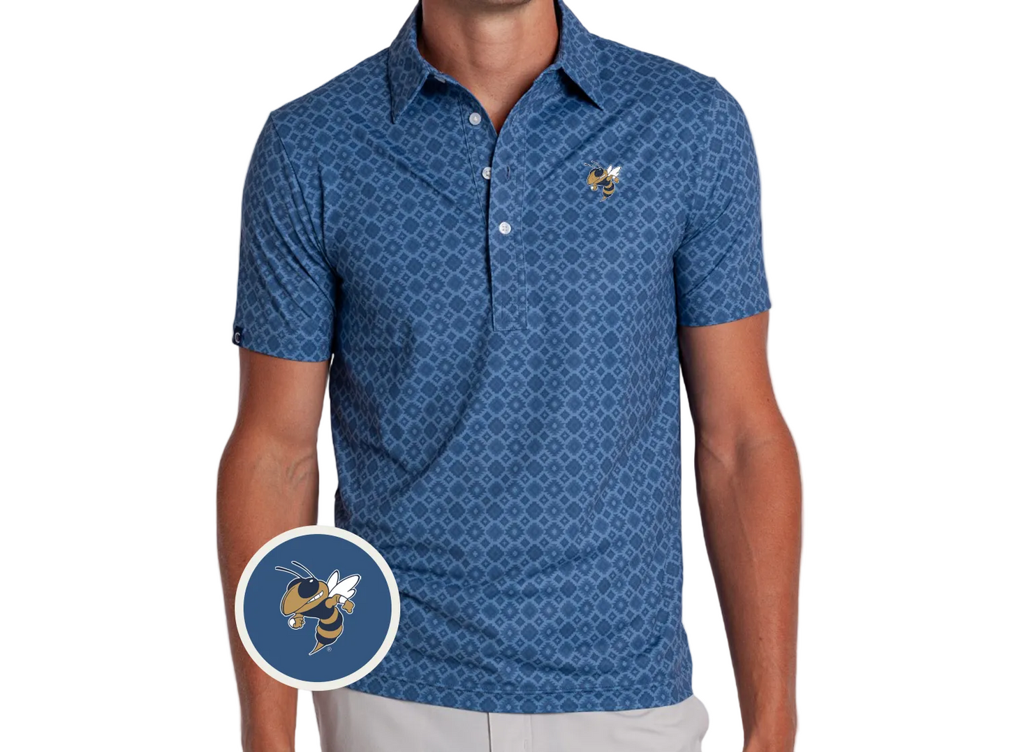 A man wearing a blue short-sleeve polo shirt with a repeating geometric pattern and a small Georgia Tech Yellow Jacket logo on the left chest. A circular inset shows a close-up of the Yellow Jacket logo.