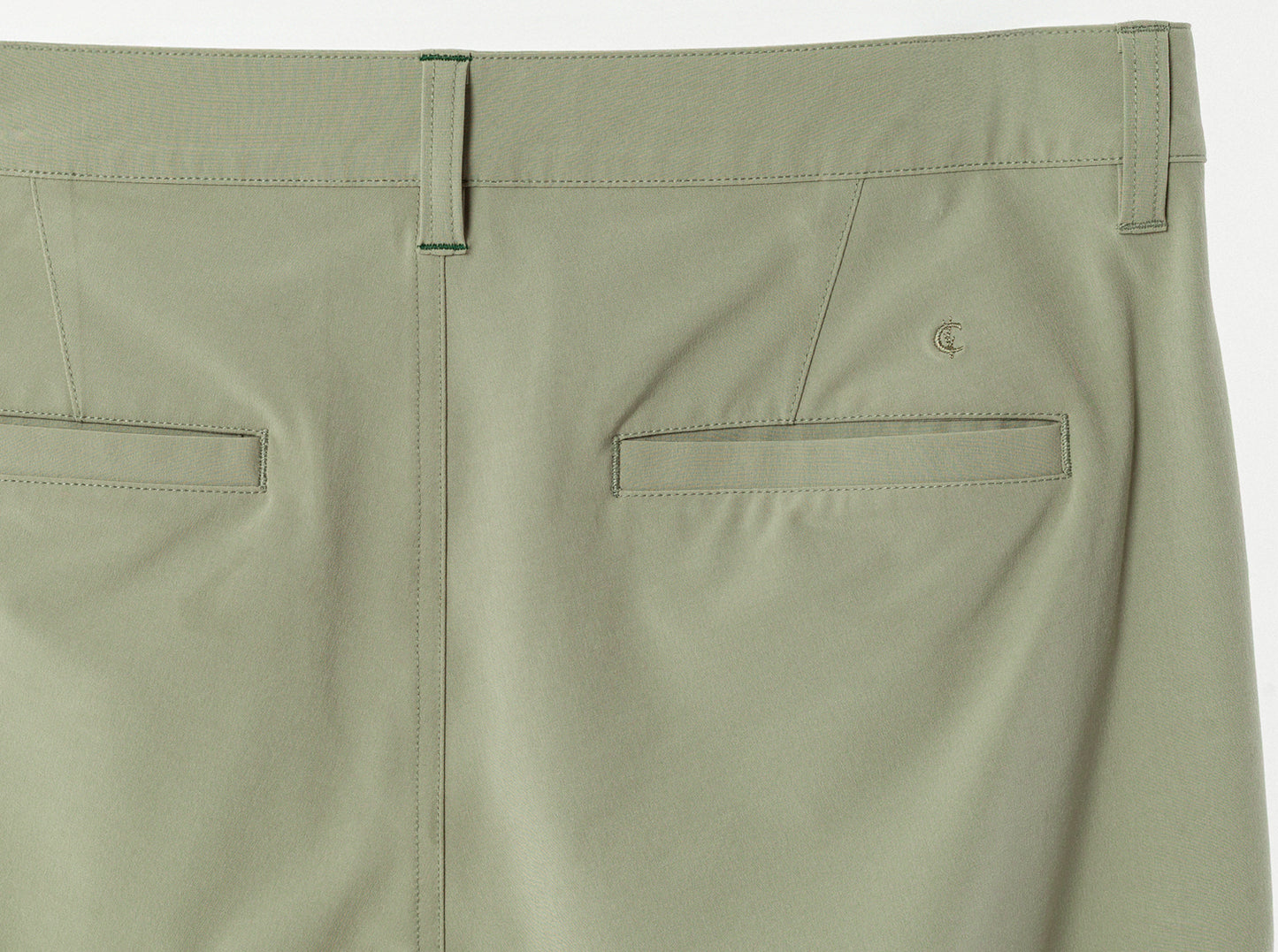 Criquet Anytime Pants in Sage, studio photo