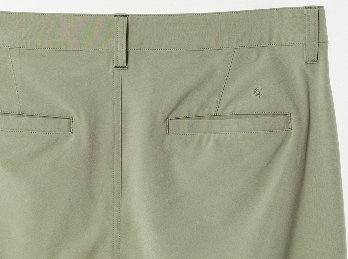 Criquet Anytime Pants in Sage, studio photo